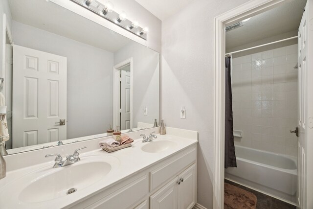 418 Long Cove Ct, Allen, TX 75002 - full bathroom featuring double vanity and shower / bath combo with shower curtain