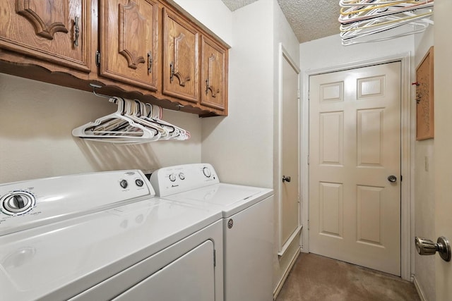 1419 Juniper Ln, Lewisville, TX 75077 - laundry area featuring washer and dryer, cabinet space, a textured ceiling, and carpet