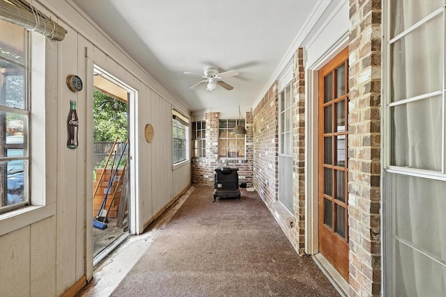 1419 Juniper Ln, Lewisville, TX 75077 - sunroom / solarium with ornamental molding, a ceiling fan, and carpet