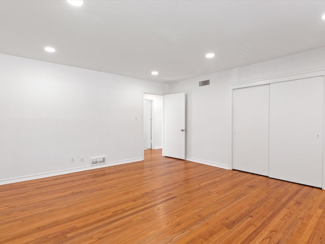 4608 Winthrop Ave E, Fort Worth, TX 76116 - unfurnished bedroom featuring light wood-style floors, recessed lighting, and a closet