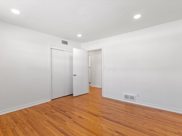 4608 Winthrop Ave E, Fort Worth, TX 76116 - unfurnished bedroom featuring light wood-style floors, recessed lighting, and a closet