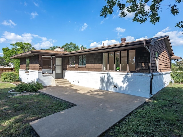 4608 Winthrop Ave E, Fort Worth, TX 76116 - view of front of home featuring brick siding, a chimney, entry steps, and a patio area