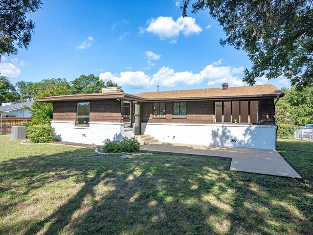 4608 Winthrop Ave E, Fort Worth, TX 76116 - rear view of property with a lawn, brick siding, and a patio area