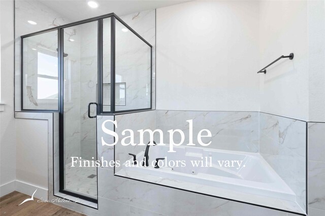 6602 Beals Creek Dr, Abilene, TX 79606 - full bath featuring a jetted tub, a marble finish shower, and wood finished floors