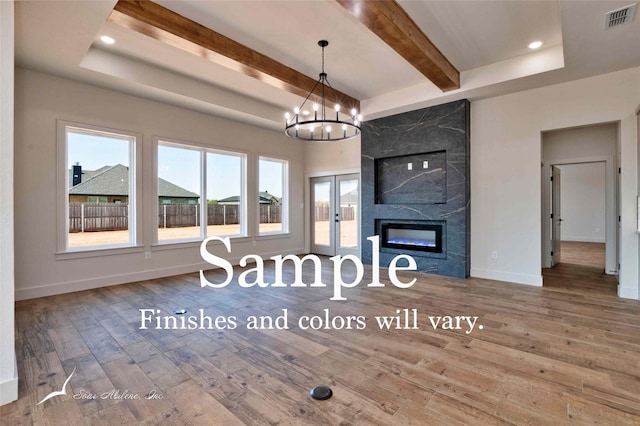 6602 Beals Creek Dr, Abilene, TX 79606 - living room with beam ceiling, wood finished floors, a chandelier, a high end fireplace, and recessed lighting