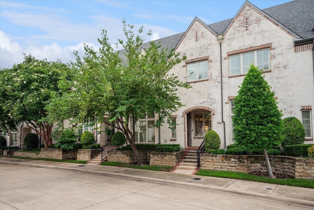 17227 Lechlade Ln, Dallas, TX 75252 - view of front of house with brick siding