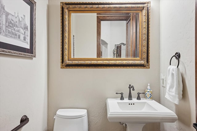 17227 Lechlade Ln, Dallas, TX 75252 - half bathroom with toilet and a sink