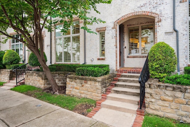 17227 Lechlade Ln, Dallas, TX 75252 - doorway to property featuring brick siding