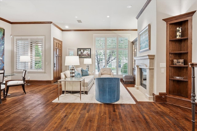 17227 Lechlade Ln, Dallas, TX 75252 - living area featuring wood finished floors, ornamental molding, a premium fireplace, and recessed lighting