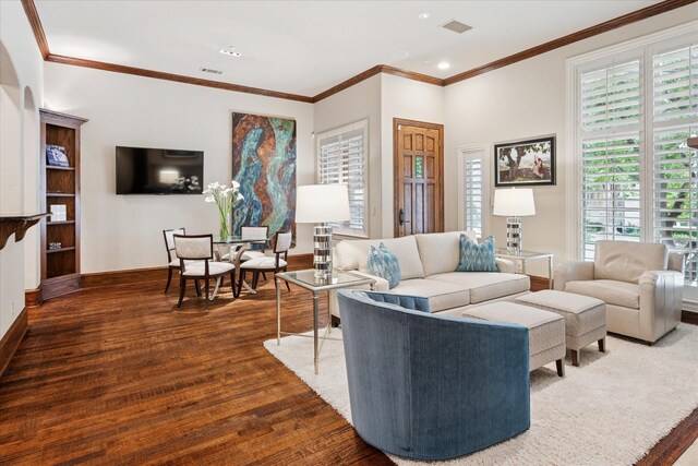 17227 Lechlade Ln, Dallas, TX 75252 - living area with healthy amount of natural light, wood finished floors, crown molding, and recessed lighting