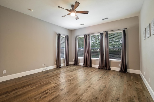 2413 Bachman Dr, Flower Mound, TX 75028 - unfurnished room featuring hardwood / wood-style flooring, ceiling fan, and a smoke detector