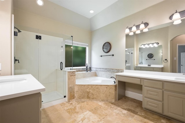 2413 Bachman Dr, Flower Mound, TX 75028 - bathroom with a shower stall, two vanities, a bath, and a high ceiling
