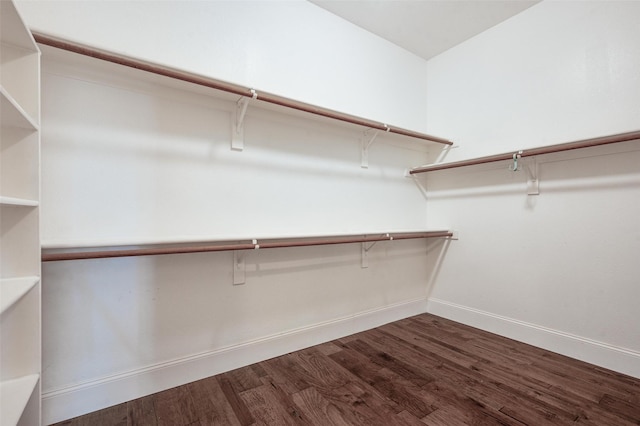 2413 Bachman Dr, Flower Mound, TX 75028 - spacious closet featuring dark wood-type flooring