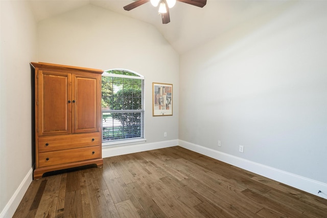 2413 Bachman Dr, Flower Mound, TX 75028 - unfurnished room with vaulted ceiling, a ceiling fan, and dark wood-style floors