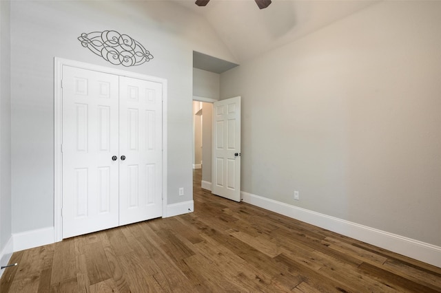 2413 Bachman Dr, Flower Mound, TX 75028 - unfurnished bedroom with wood finished floors, a closet, lofted ceiling, and ceiling fan