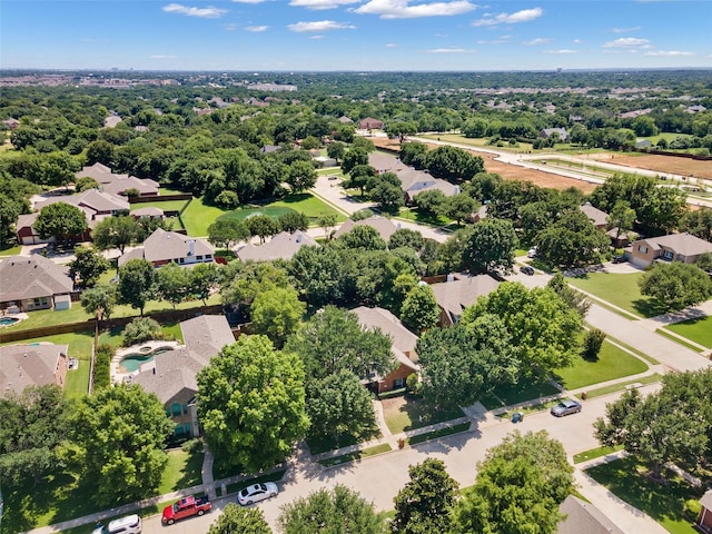 2413 Bachman Dr, Flower Mound, TX 75028 - aerial view of residential area with a tree filled landscape
