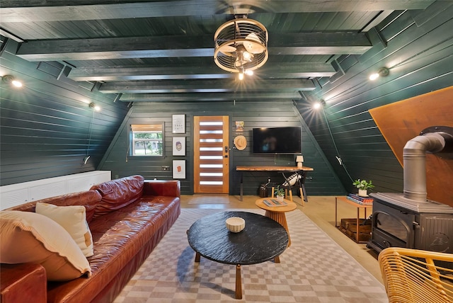 120 Lakeway Ln, Gun Barrel City, TX 75156 - living room featuring wooden walls, beamed ceiling, and a wood stove