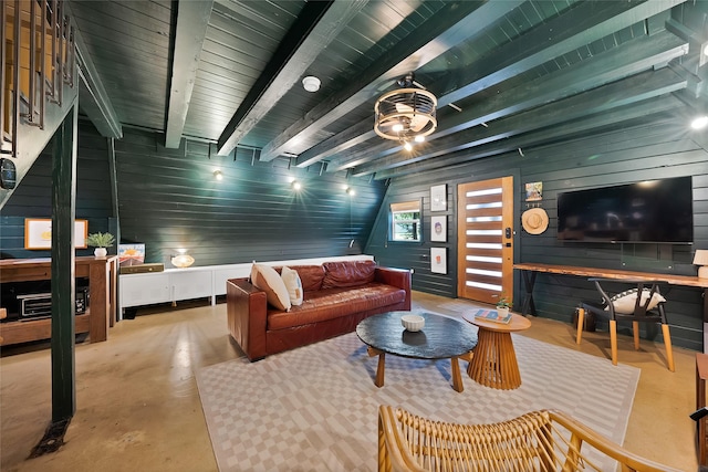 120 Lakeway Ln, Gun Barrel City, TX 75156 - living room with wooden walls, beamed ceiling, stairs, and concrete flooring