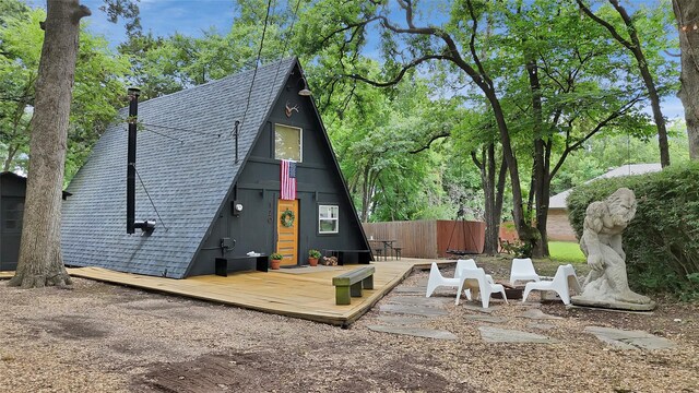 120 Lakeway Ln, Gun Barrel City, TX 75156 - back of property with roof with shingles and a deck