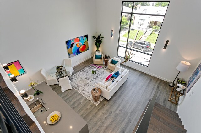 3880 Munger Ave Unit 2, Dallas, TX 75204 - living room featuring wood finished floors