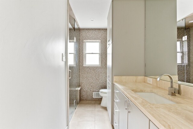 9412 Hunters Creek Dr, Dallas, TX 75243 - full bath with vanity, tile patterned floors, and a shower stall