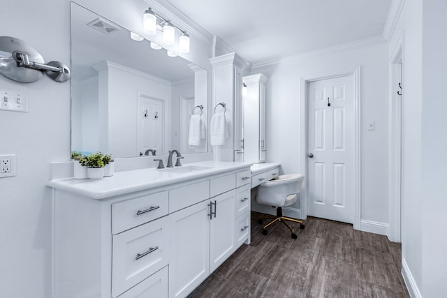 9867 Dripping Springs Rd, Denison, TX 75021 - bathroom with vanity, crown molding, and wood finished floors