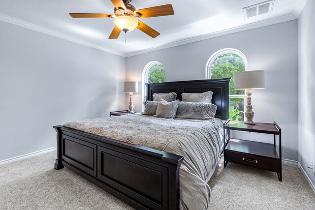 9867 Dripping Springs Rd, Denison, TX 75021 - bedroom with light colored carpet, crown molding, and ceiling fan