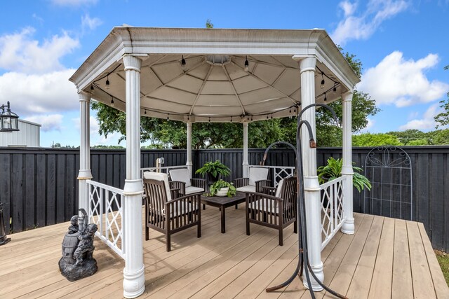 9867 Dripping Springs Rd, Denison, TX 75021 - wooden deck with a gazebo and an outdoor hangout area