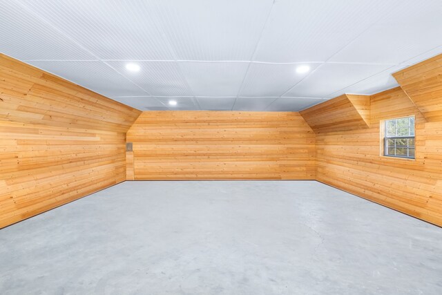 9867 Dripping Springs Rd, Denison, TX 75021 - additional living space featuring wooden walls, recessed lighting, and concrete floors