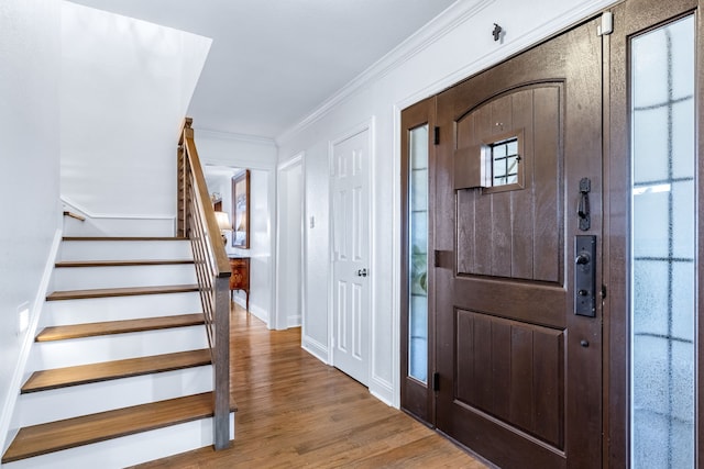 9867 Dripping Springs Rd, Denison, TX 75021 - foyer featuring stairway, crown molding, and wood finished floors