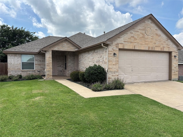 5905 Pacers Ln, Fort Worth, TX 76179 - view of front of property with roof with shingles, brick siding, a front yard, concrete driveway, and a garage