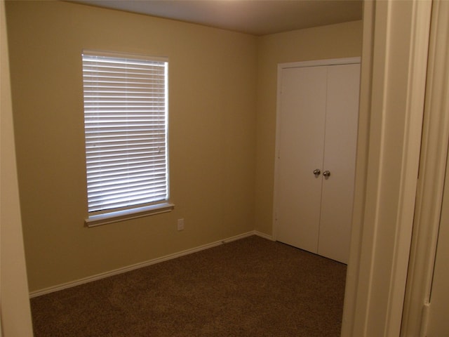5905 Pacers Ln, Fort Worth, TX 76179 - unfurnished bedroom featuring dark carpet and a closet