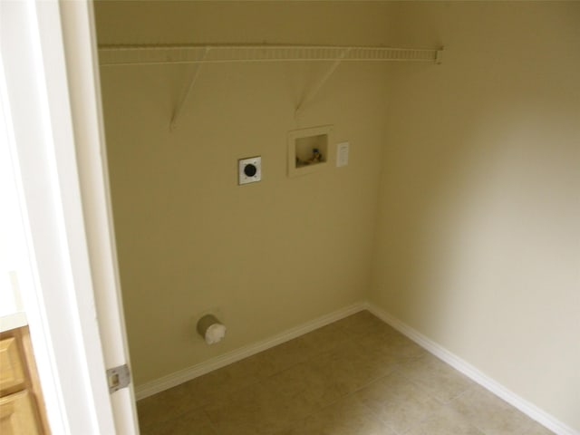 5905 Pacers Ln, Fort Worth, TX 76179 - laundry area featuring electric dryer hookup, hookup for a washing machine, and light tile patterned floors