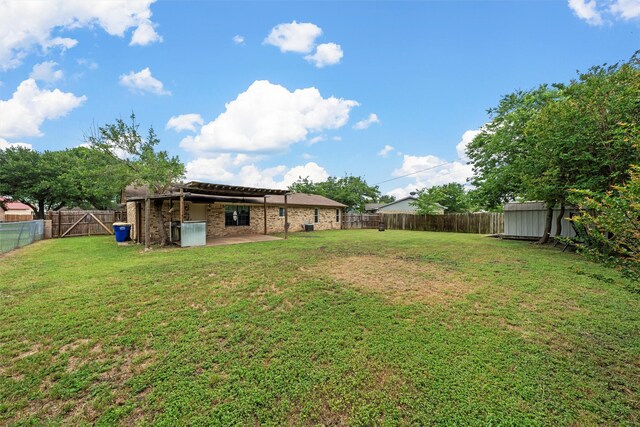 202 Lee Ln, Lorena, TX 76655 - fenced backyard featuring a patio area