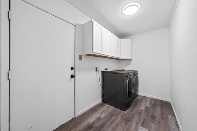 202 Lee Ln, Lorena, TX 76655 - laundry area featuring cabinet space, independent washer and dryer, and dark wood-style flooring