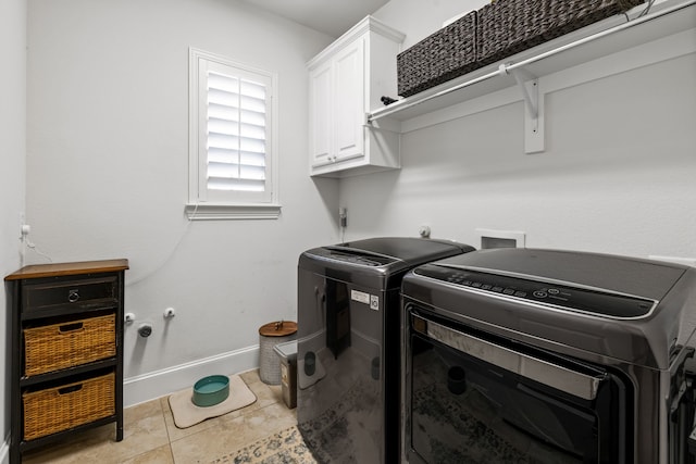 1861 Snapdragon Rd, Frisco, TX 75033 - washroom featuring cabinet space, washer and dryer, and tile patterned flooring