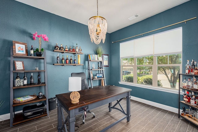 4001 Bamboo Trl, Mckinney, TX 75071 - office featuring wood finish floors, a chandelier, and a dry bar