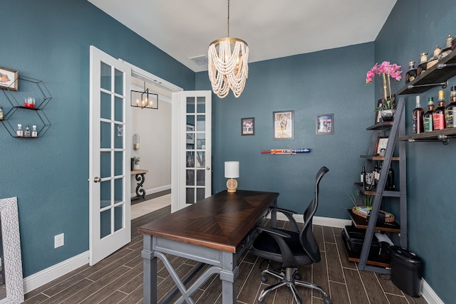 4001 Bamboo Trl, Mckinney, TX 75071 - office space with a chandelier, wood finish floors, and french doors
