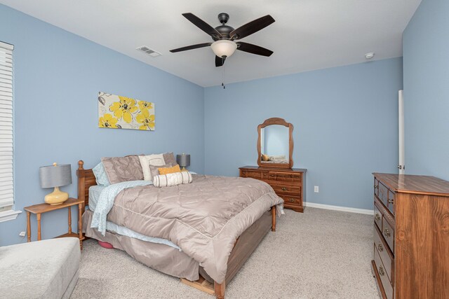 4001 Bamboo Trl, Mckinney, TX 75071 - bedroom with light carpet and a ceiling fan