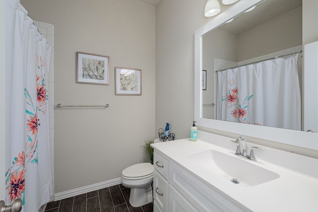 4001 Bamboo Trl, Mckinney, TX 75071 - bathroom featuring vanity, wood tiled floors, and curtained shower