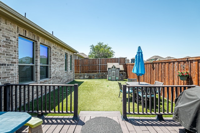 4001 Bamboo Trl, Mckinney, TX 75071 - wooden deck featuring a fenced backyard, a grill, and outdoor dining space