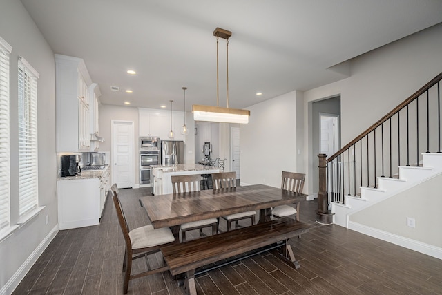 4001 Bamboo Trl, Mckinney, TX 75071 - dining space featuring dark wood-style flooring, plenty of natural light, stairway, and recessed lighting