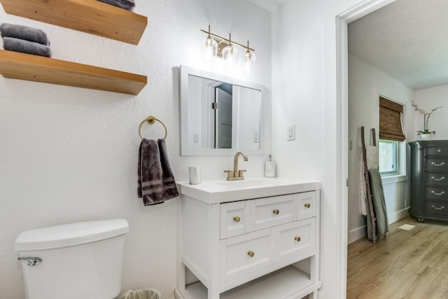 105 Causeway Ct, Gun Barrel City, TX 75156 - bathroom featuring wood finished floors and vanity