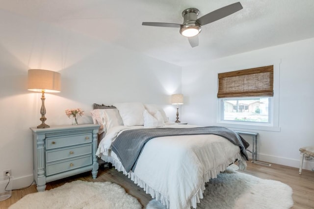 105 Causeway Ct, Gun Barrel City, TX 75156 - bedroom with wood finished floors and a ceiling fan