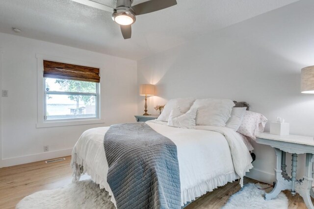 105 Causeway Ct, Gun Barrel City, TX 75156 - bedroom with wood finished floors and ceiling fan