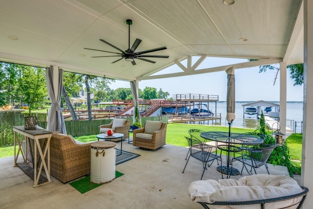 105 Causeway Ct, Gun Barrel City, TX 75156 - view of patio / terrace featuring ceiling fan, outdoor dining area, and a water view