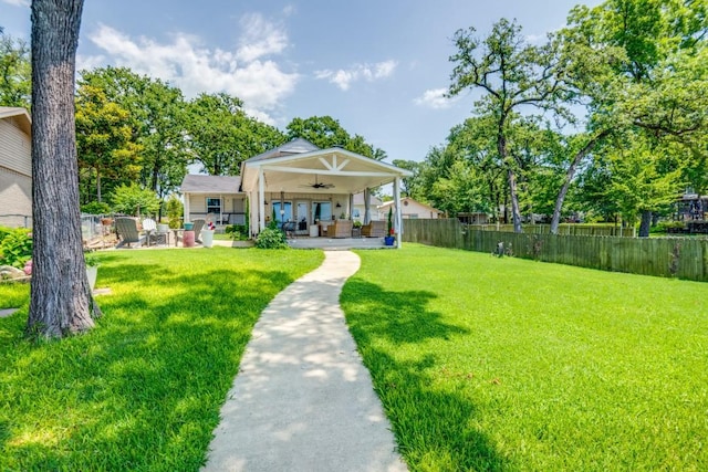 105 Causeway Ct, Gun Barrel City, TX 75156 - view of yard featuring a ceiling fan, a patio area, and an outdoor living space
