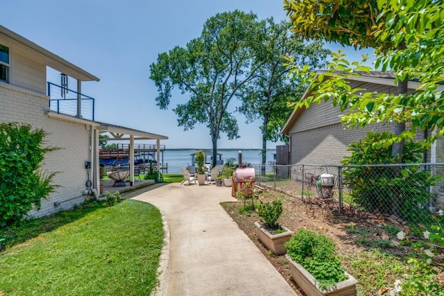 105 Causeway Ct, Gun Barrel City, TX 75156 - view of yard with a water view and a patio area