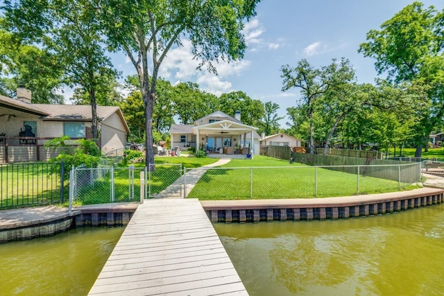 105 Causeway Ct, Gun Barrel City, TX 75156 - dock with a fenced front yard and a water view
