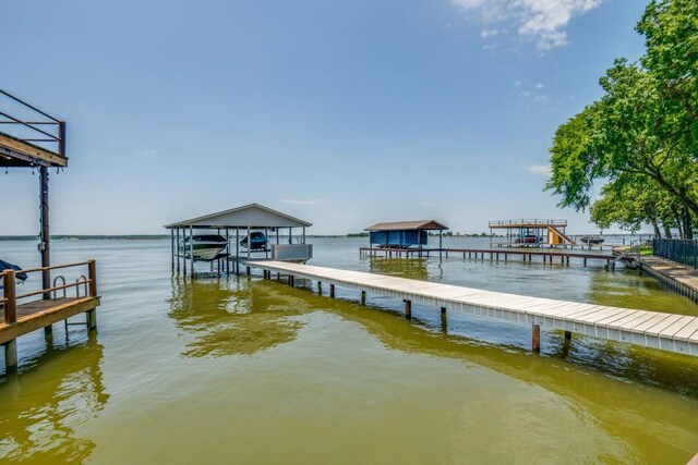 105 Causeway Ct, Gun Barrel City, TX 75156 - dock with boat lift and a water view